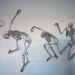 4 cut-out skeleton drawings.