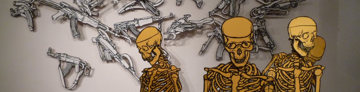 Human skeletons and Kalashnikov rifle drawings